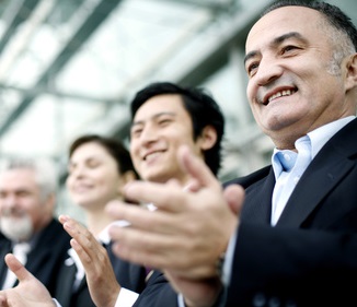 Corporate people clapping hands. Corporate people clapping hands.